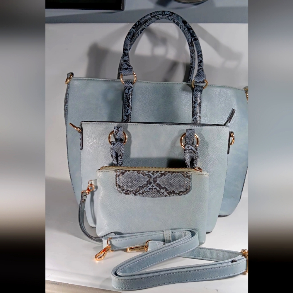 3 Purses- Lrg Tote/Medium Purse/Small Clutch all together.  In style blue color.